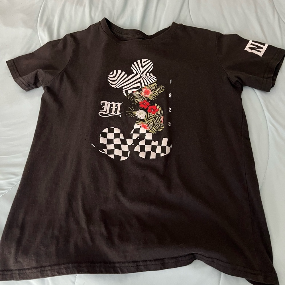 Black Graphic T-Shirt with Floral and Checkered Design
